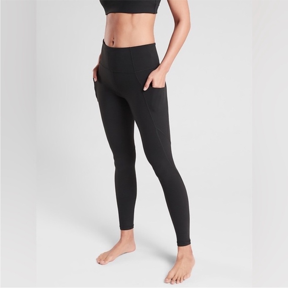 Athleta Black Salutation Stash Pocket Tight size Large